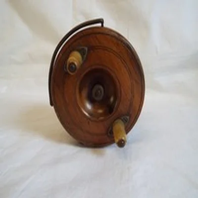 Vintage brass mounted wood Nottingham star back 4" reel