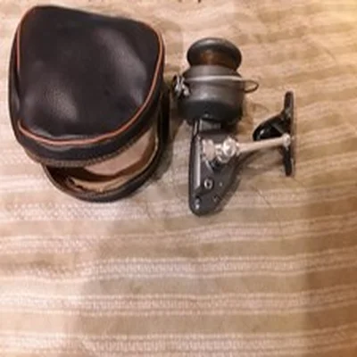 vintage fishing reel and case diamond super 1000
