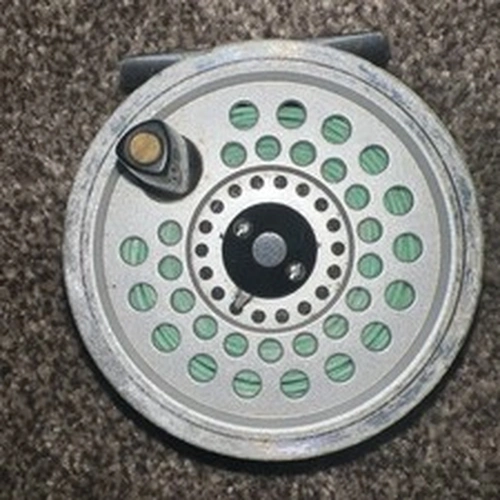 A USABLE DAIWA SF 708 FLY REEL FOR #7-8-9 LINES GOOD WORKING ORDER.