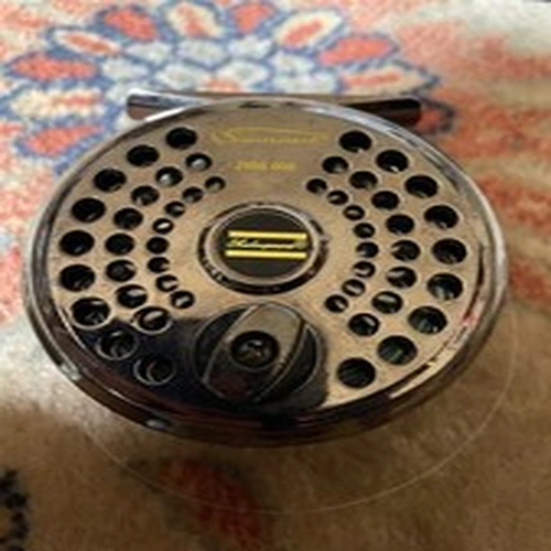 used fly fishing reels Shakespeare Summit with two spools, a Dam and Masterline