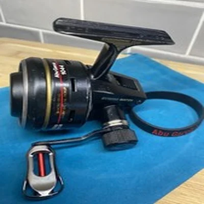Abu Garcia 1044 Synchro Match Closed Face Reel/Custom knob/ New Vent Band/Pouch 