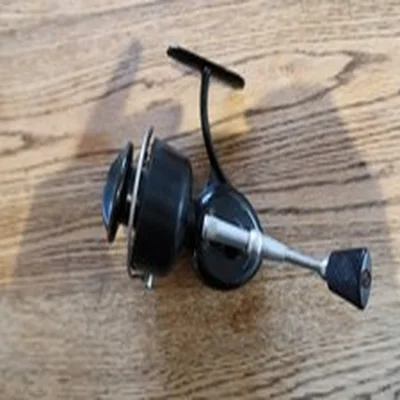 vintage mitchell (Kirk-Odo) fishing reel.
