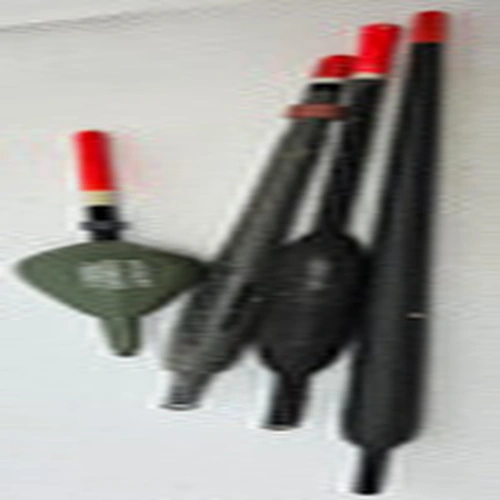 Two Peter Drennen floats with two  other Fishing Floats