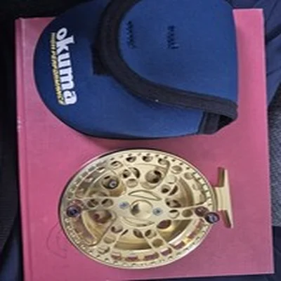 OKUMA Sheffield S 1002 gold 4.5" Center Pin Fishing Reel with neoprene case