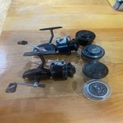 2 x Mitchell fishing reels. 1 Garcia autobail, 1 Mitchell 301A with spare spools