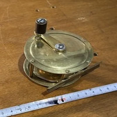 Vintage Brass Fishing Reel with Ratchet. Unmarked Wooden Handle AD