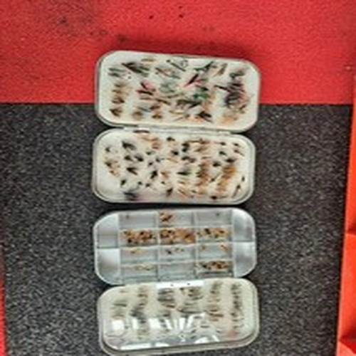 Clear out finds assorted rods reels flies waders and net.