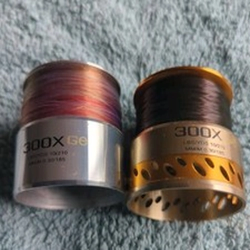 Pair Of Mitchell Spools; Silver 300XGe, Gold 300XGe, both With Line