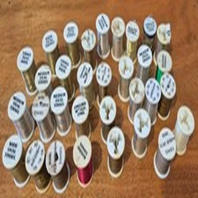 FLY TYING 32 SPOOLS OF TINSEL THREAD AS PICTURED SOME UNUSED GOOD LOT