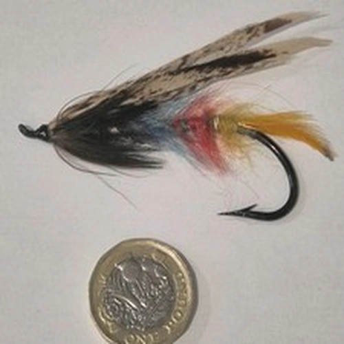 A FINE EARLY VINTAGE STEEL EYED SALMON FLY APROX 8/0 NICE COLLECTORS PIECE
