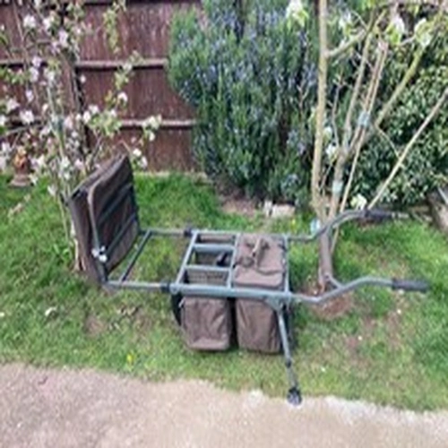 Nash Trax Metro MK2 carp barrow. Used in v/good condition. Extra front bag.