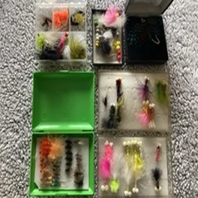 JOB LOT OF A COLLECTION OF TROUT/SALMON FISHING FLIES + HIGHLAND FLY BROOCH