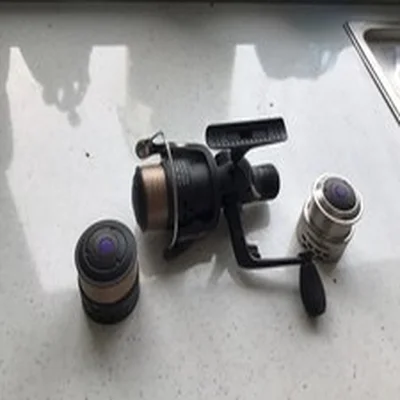 Drennan series 7 fishing reel with two spare spools