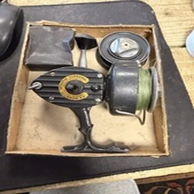 Vintage K. P. Morritt's Intrepid De Luxe fishing reel, boxed with accessories