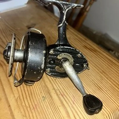 KP MORRIT’S  INTREPID SUPREME FIXED SPOOL REEL IN GOOD USED CONDITION