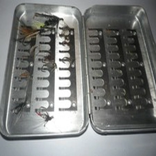 aluminium fly fishing case with some fly by perrine