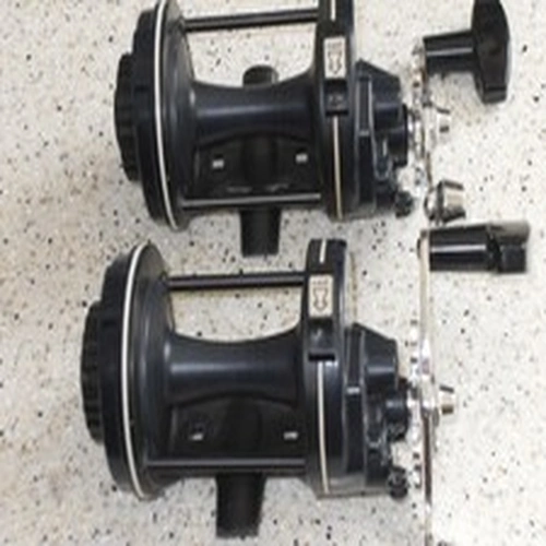 2 Vintage carbon fibre intrepid sea streak sea fishing reels