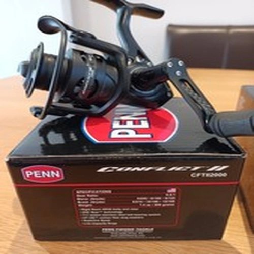 PENN CONFLICT II 2000 SPINNING REEL BOXED