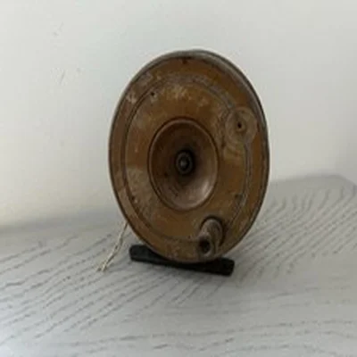 Vintage wooden fishing reel