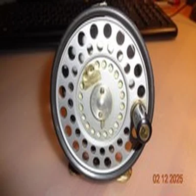 HARDY HUSKEY 3 3/8" SILENT CHECK WIDE RIMMED FLY REEL