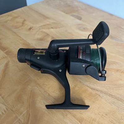 Mitchell Excellence 60 Special  reel with spare spool, bag and manual.