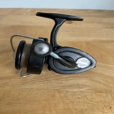 Mitchell Garcia 300  vintage spinning fishing reel. Good condition. With manual