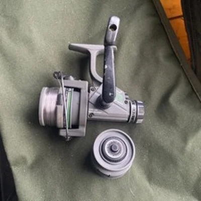 Shakespeare Mk II Graphite Spinning Fishing Reel with Line