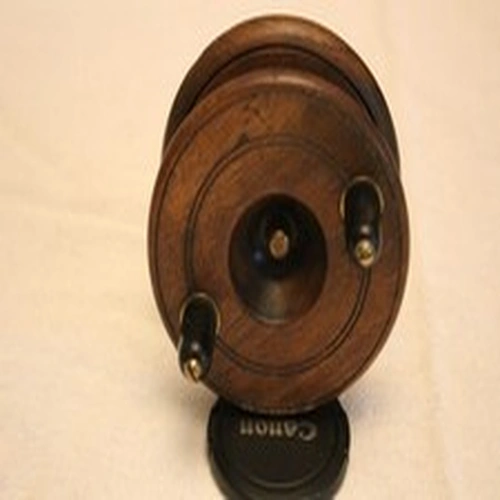 54. 4" Wood and Brass Strapback Centrepin Reel