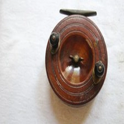 101. 4" Eton Sun Wood and Brass Centrepin Reel