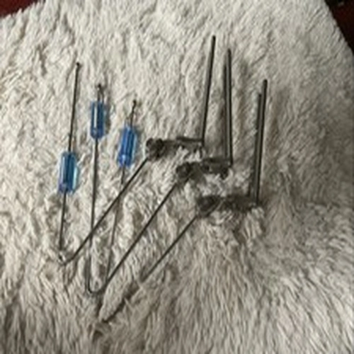 Three Stainless Matrix Snag Ears With Blue hockey stick Swingers 2 isotopes 
