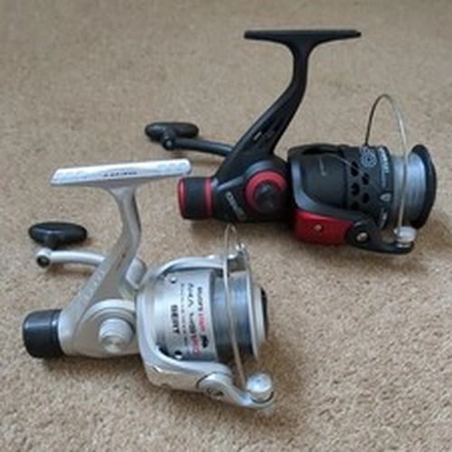 A Pair of Cheap Fishing Reels.