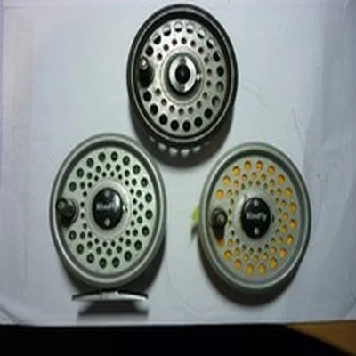 A Leeda Rimfly Reel with Two Spare Spools all loaded with Fly Lines