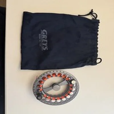 Greys GX900 fly reel & spare spool, neoprene reel case & spare spool bag