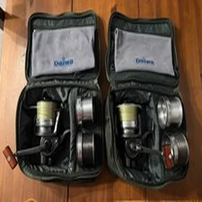 Daiwa Infinity-X 5000 BR x 2 Fishing Reel with extra spools and cases.