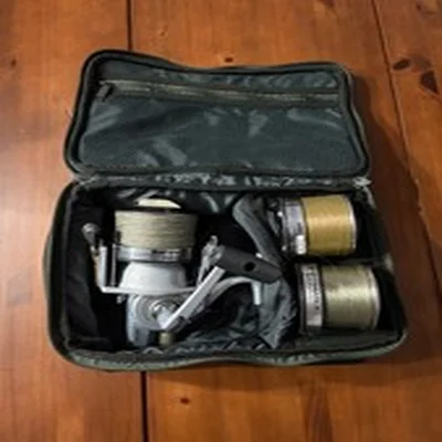 Daiwa Infinity - X 5000 BR Fishing Reel with extra spools and case