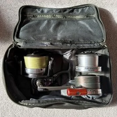 Daiwa Infinity - X 5000 BR Fishing Reel with extra spools and case