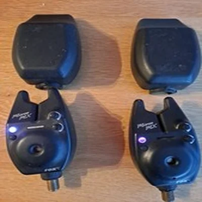 Pair Of Fox Micron MX Bite Alarms With Hard Covers And Batteries