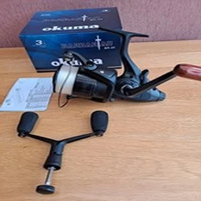Okuma Barbarian BN-55 Baitrunner Reel With  15lb Line + Spare Twin Handle Boxed