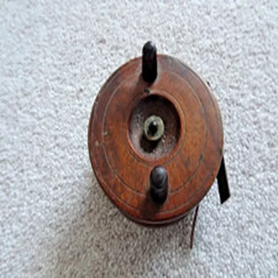 Mahogany and Brass fishing reel