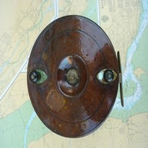 A 7 ½  inch Wood & Brass Centre Pin Reel