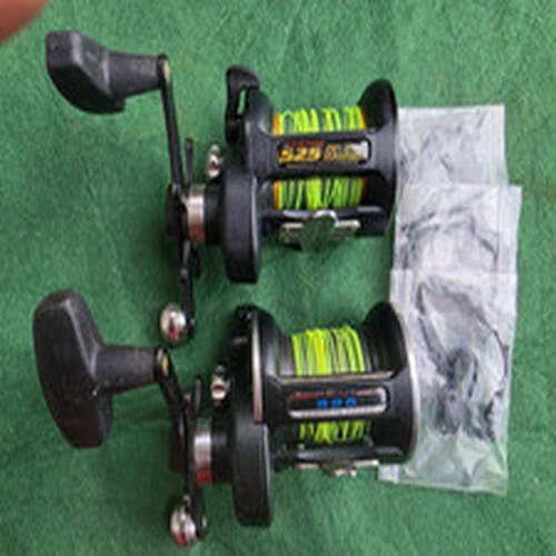 PENN 525 MAG and a PENN 525 GS beachcasting reels. 
