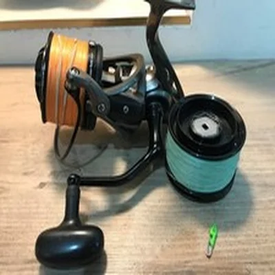 Akios Utopia CX8 Fishing Reel and Spare Braided Spool