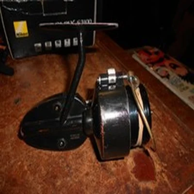 VINTAGE MITCHELL HALF BAIL ARM REEL.MADE IN FRANCE.