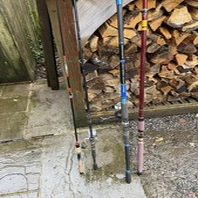 4x  Fishing Rod Rods, 2 with reels. Barely used