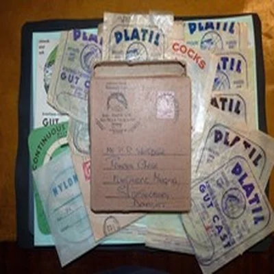 Vintage fishing, Alex Martin card box and gut casts/packets.