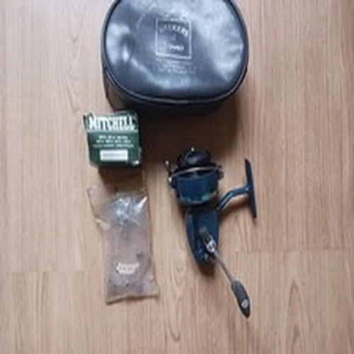Mitchell 410A Spinning  Reel with boxed spare spool and original bail arm