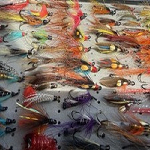 Approx 140 Salmon Flies and large double sided Fly Box