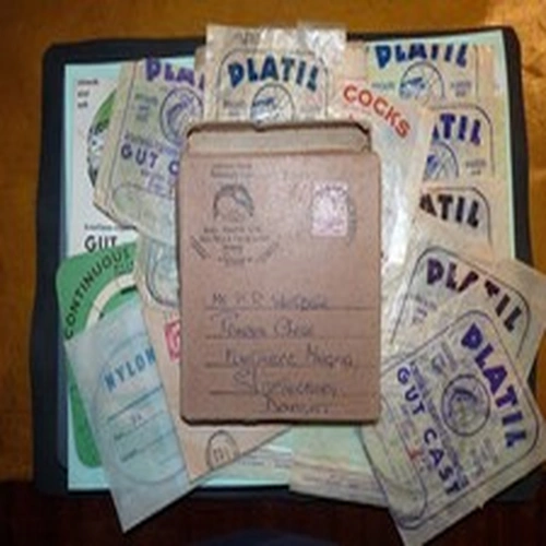 Vintage fishing, Alex Martin card box and gut casts/packets.