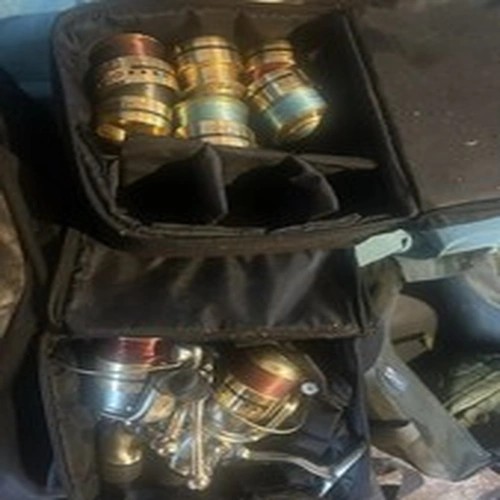 A pair of Shakespeare Mach 3 fishing reels 4000 & 3500 with 3 spools & bag