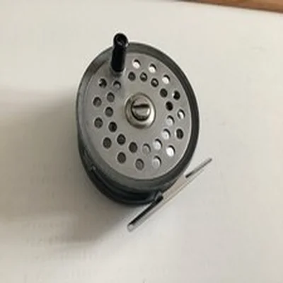 A FARLOWS GRENABY 3 INCH FLY FISHING REEL.               (1060)